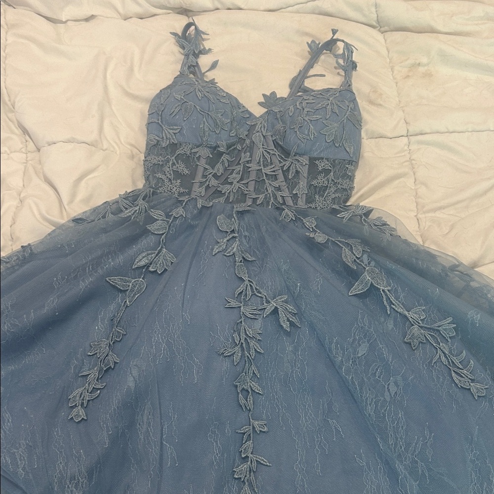 Elegant Blue Lace Dress with Floral Details